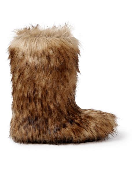 celine faux fur boots.